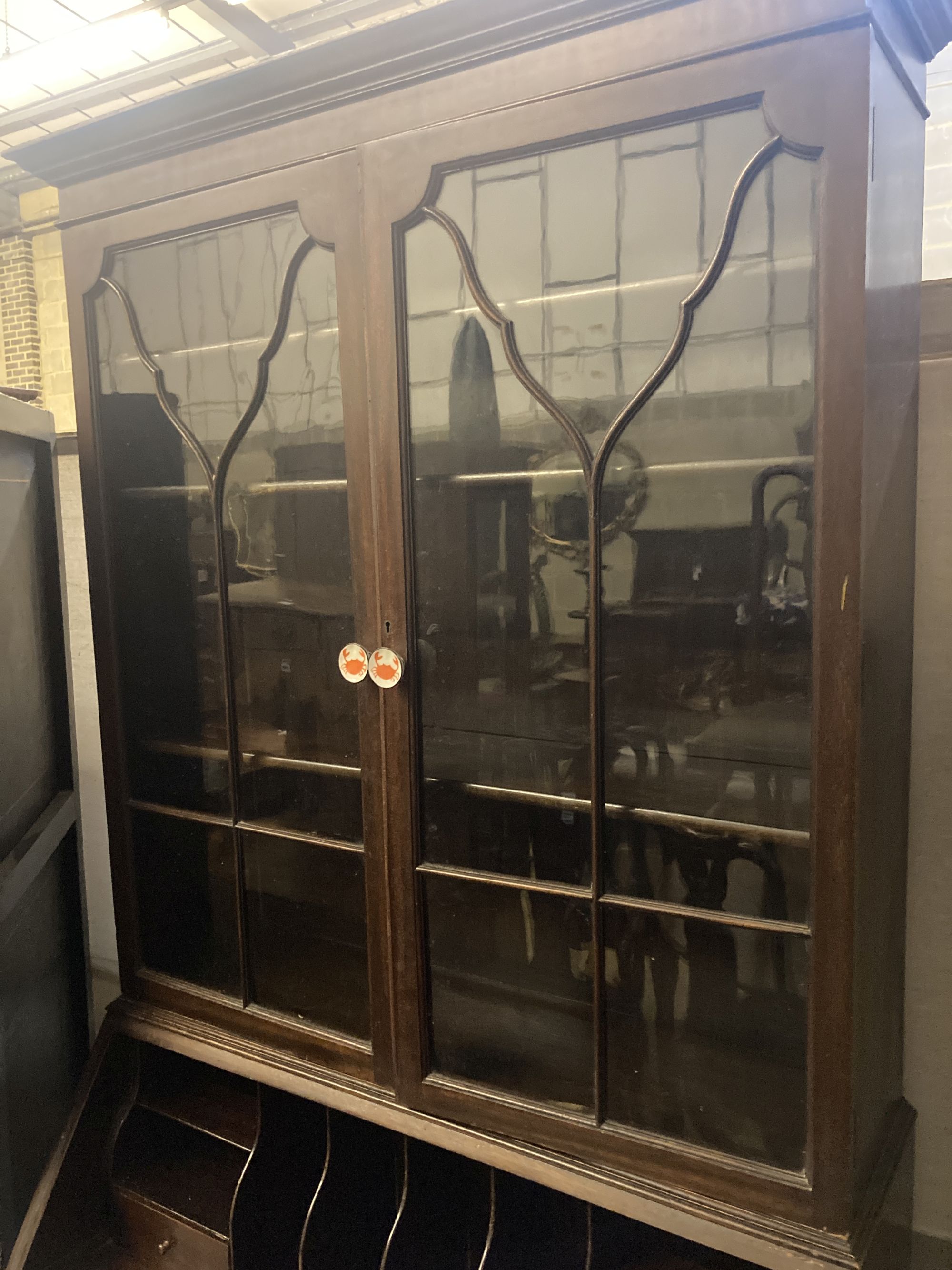 A 1920s mahogany bureau bookcase, width 92cm depth 44cm height 209cm